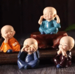 AMGHUB Monk Figurines – 4-Piece Decorative Resin Set for Home & Office Décor | Peaceful Buddha Monk Statues for Shelf, Desk & Gifting